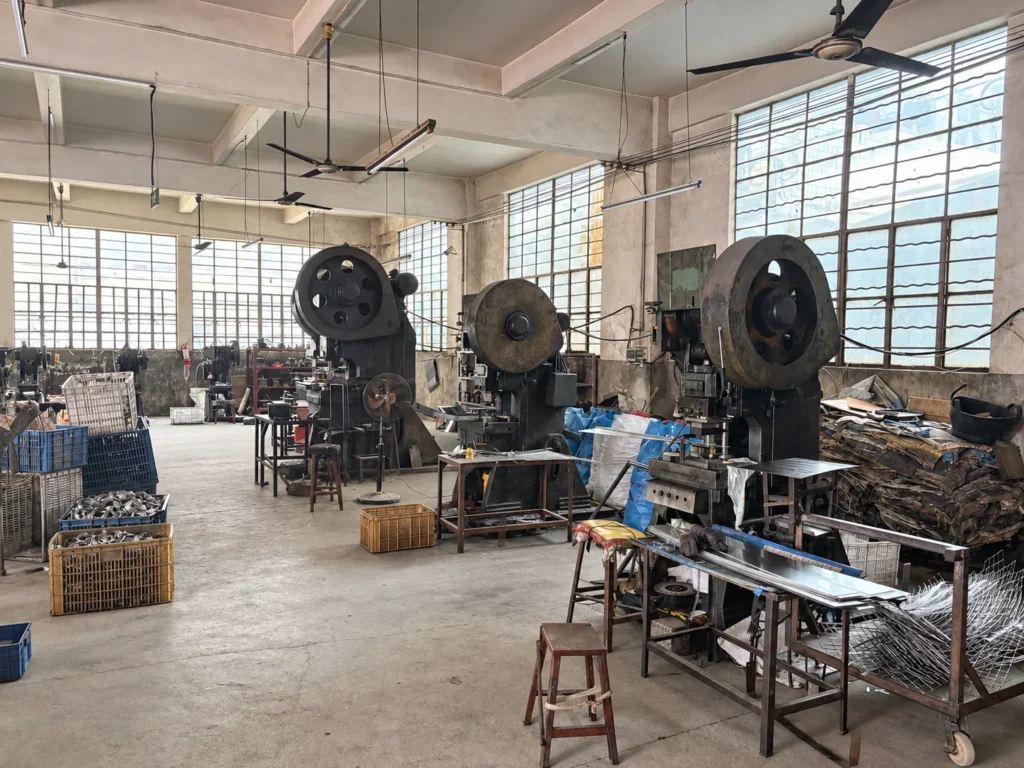 Mechanical stamping presses inside Jinxing Hardware factory in Quanzhou