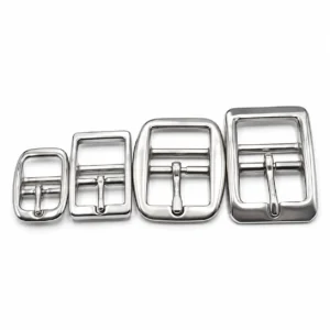 Four stainless steel girth buckles in graduated sizes