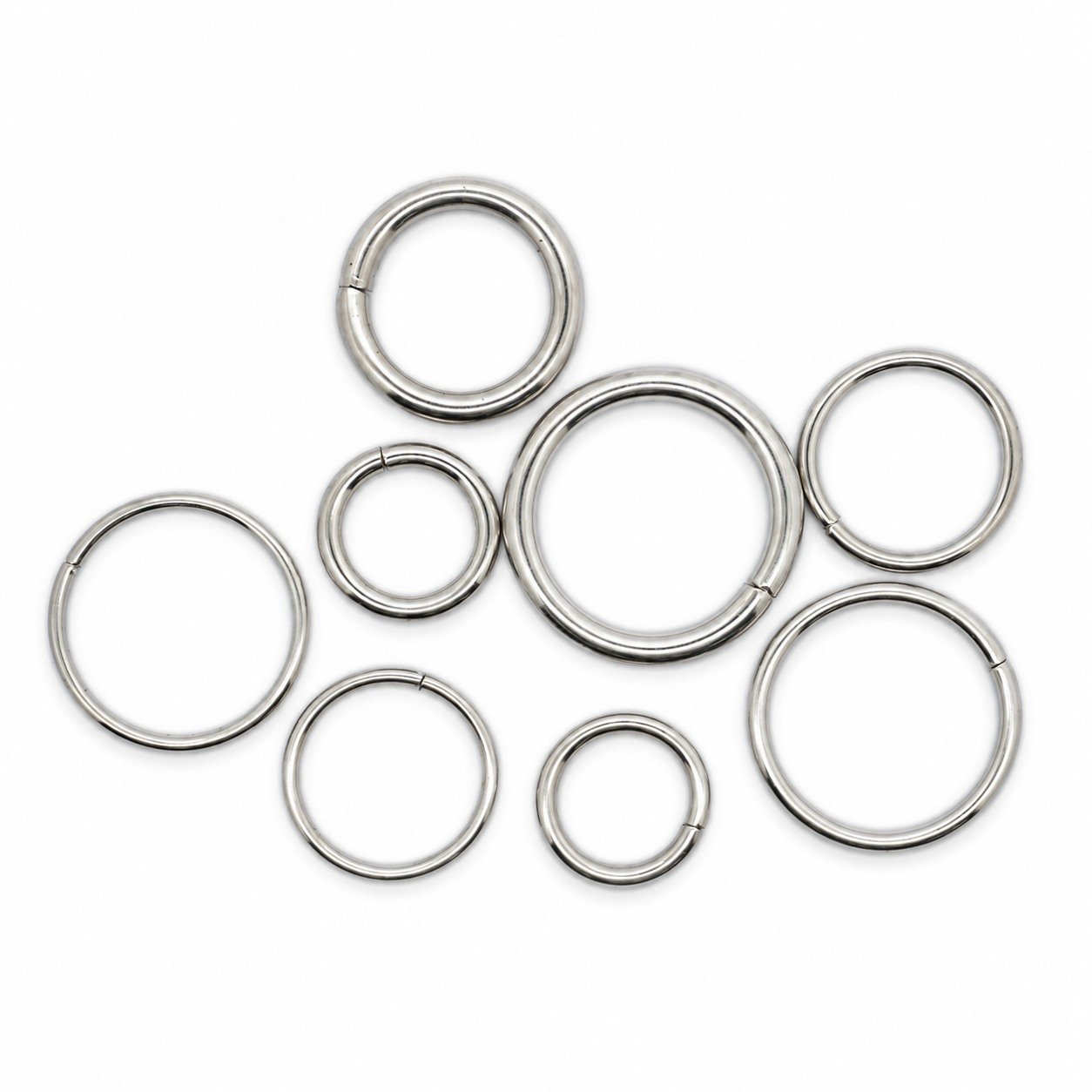 Welded steel O-rings in assorted sizes for pet collars, harnesses and leads